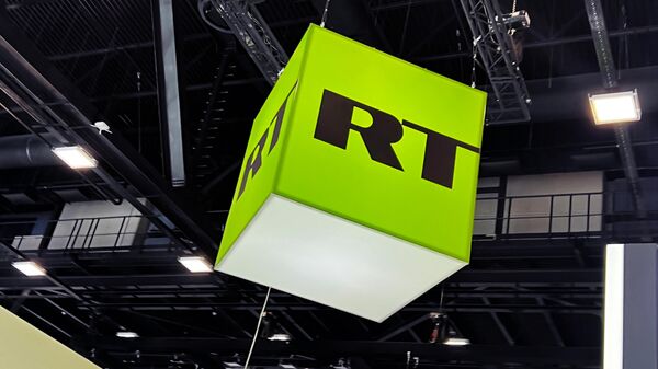 The logo of the RT TV channel at the SPIEF-2023 site. - Sputnik Africa