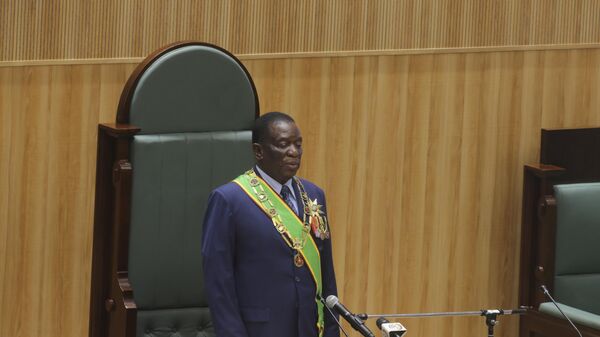 Zimbabwean President Emmerson Mnangagwa prepares to deliver his speech in parliament during his State of the Nation address in Harare, Zimbabwe, Oct. 3, 2023. - Sputnik Africa