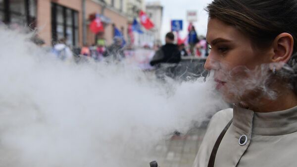 A participant in a women's protest in Minsk. - Sputnik Africa