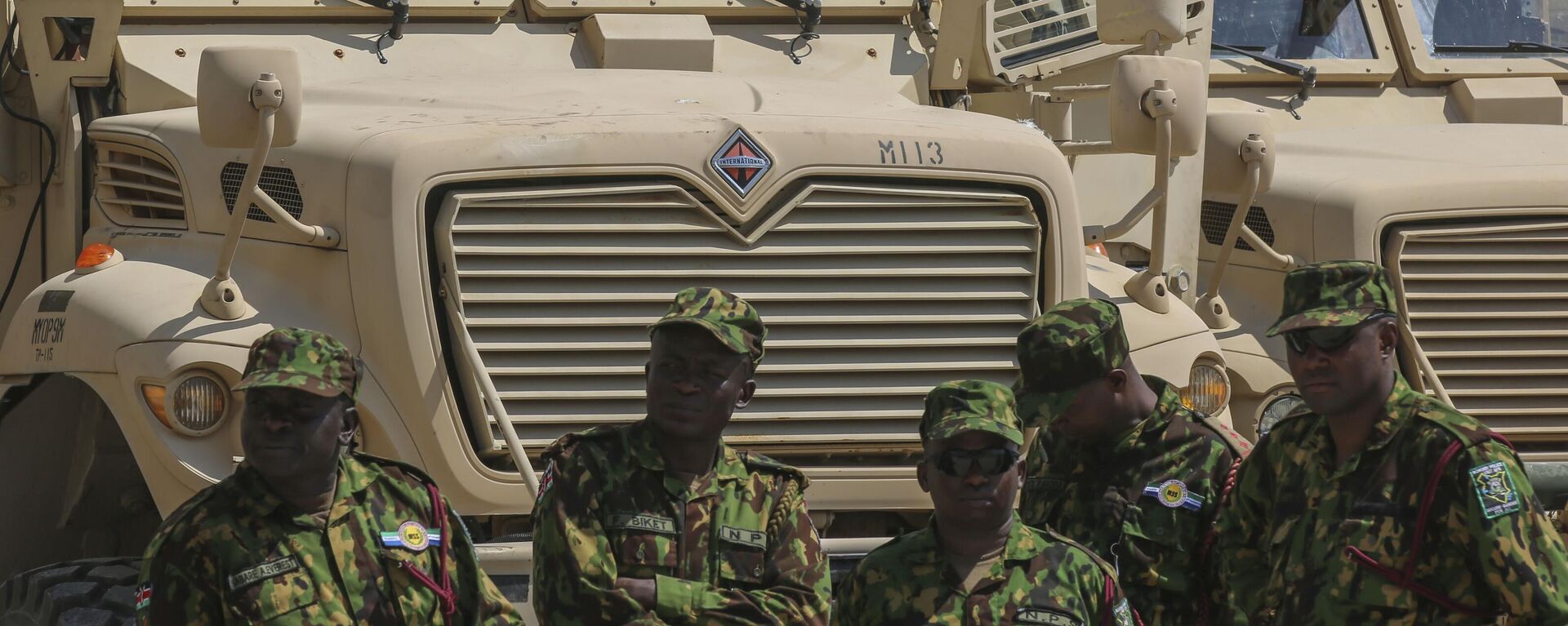 Kenyan police officers, part of a UN-backed multinational force, stand next to armored vehicles on their base during a visit by Kenya's President William Ruto, in Port-au-Prince, Haiti, Saturday, Sept. 21, 2024. - Sputnik Africa, 1920, 25.09.2024