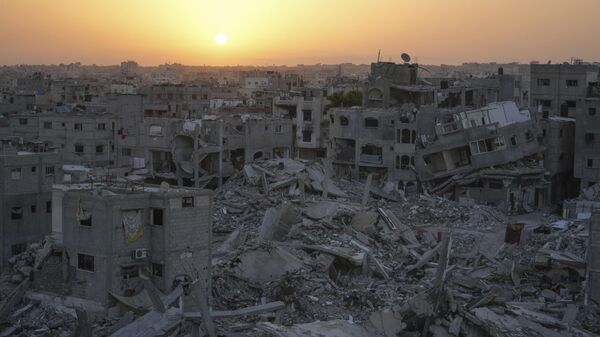 Destruction left by the Israeli air and ground offensive is seen in Khan Younis, Gaza Strip, Friday, Sept. 13, 2024. - Sputnik Africa