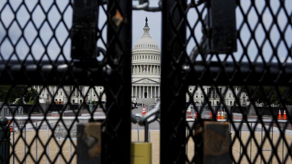 The US Capitol is seen behind a security fence ahead of Israeli Prime Minister Benjamin Netanyahu's speech, July 24, 2024 - Sputnik Africa