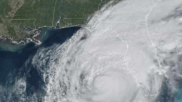Cette image satellite GOES-16 GeoColor prise à 11h46 HAE et fournie par la National Oceanic and Atmospheric Administration (NOAA) montre l'ouragan Milton dans le golfe du Mexique au large des côtes de la Floride, le mercredi 9 octobre 2024. (NOAA via AP) - Sputnik Afrique