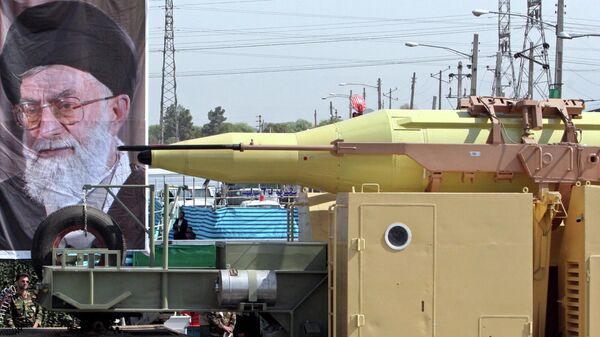 In front of a picture of supreme leader, Ayatollah Ali Khamenei, Iran's Shahab-3 missile, a weapon capable of carrying a nuclear warhead and reaching Europe, Israel and U.S. forces in the Middle East, is displayed during a parade ceremony, marking 25th anniversary of the outset of the Iran-Iraq war (1980-1988) in front of the mausoleum of the late revolutionary founder Ayatollah Ruhollah Khomeini, just outside Tehran, Iran, Thursday, Sept. 22, 2005 - Sputnik Africa