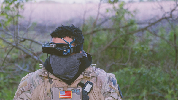 raoulduke_69 shares a picture on social media of a mercenary in Ukraine with an American flag, geotagged to Chasov Yar, April, 2024, The tattoos match those seen on Forward Observation Group's founder Derrick Bales. Published under fair use. - Sputnik Africa