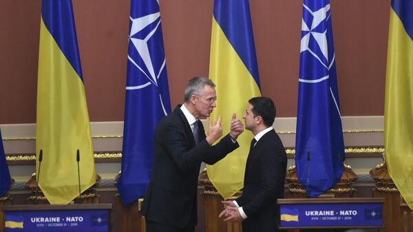 Ukrainian President Volodymyr Zelensky and NATO Secretary General Jens Stoltenberg hold a joint press conference following a meeting in Kiev on October 31, 2019 - Sputnik Africa