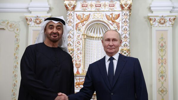 Russian President Vladimir Putin and United Arab Emirates President Sheikh Mohamed bin Zayed Al Nahyan shake hands during a meeting at the Novo-Ogaryovo state residence, outside Moscow, Russia. - Sputnik Africa