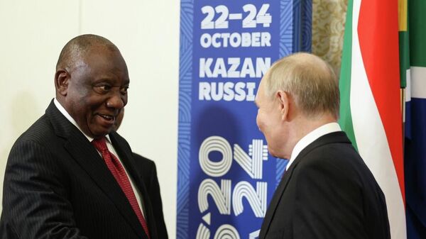 Russian President Vladimir Putin, right, and South African President Cyril Ramaphosa, left, during their meeting on the sidelines of the 16th BRICS summit in Kazan, Russia, on October 22, 2024. - Sputnik Africa