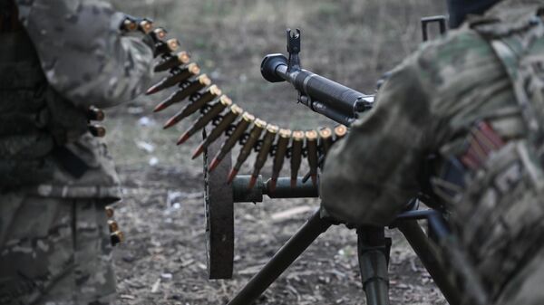 A serviceman of the 1430th Guards Motor Rifle Regiment of the Russian Armed Forces during shooting training in the Zaporizhzhya direction in the special military operation zone. - Sputnik Africa