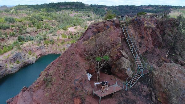 An aerial view of the remaining intact portions of Lion Cavern, Ngwenya iron ore complex in northwest Eswatini. - Sputnik Africa