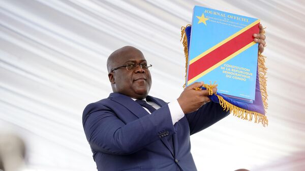 Congolese President Felix Tshisekedi holds the constitution after being sworn in in Kinshasa, Democratic Republic of the Congo, Thursday Jan. 24, 2019. - Sputnik Africa