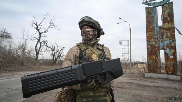 A Russian soldier in the liberated city of 
Avdeyevka - Sputnik Africa