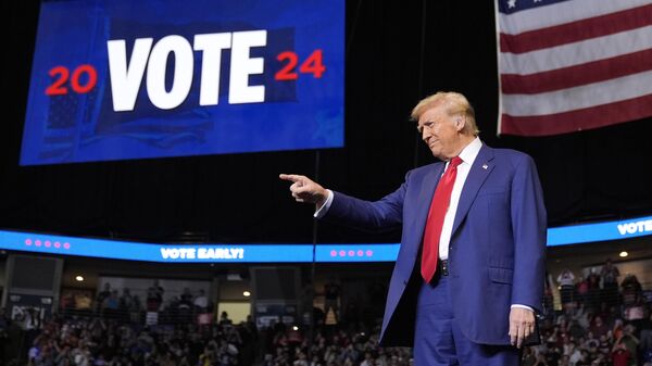 Republican presidential nominee former President Donald Trump arrives at a campaign rally at the Bryce Jordan Center, Saturday, Oct. 26, 2024, in State College, Pa - Sputnik Africa