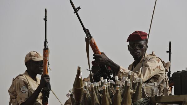 Sudanese soldiers from the Rapid Support Forces unit, led by Gen. Mohammed Hamdan Dagalo, the deputy head of the military council, secure the area where Dagalo attends a military-backed tribe's rally, in the East Nile province, Sudan, on June 22, 2019 - Sputnik Africa