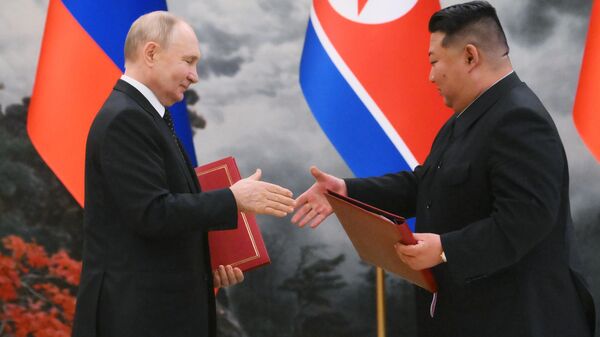 Russian President Vladimir Putin and Chairman of State Affairs of the Democratic People's Republic of Korea Kim Jong-un during the signing of the Treaty on Comprehensive Strategic Partnership between the Russian Federation and the Democratic People's Republic of Korea and a number of bilateral agreements. - Sputnik Africa