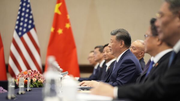 Chinese President Xi Jinping meets with President Joe Biden during a bilateral meeting, Saturday, Nov. 16, 2024, in Lima, Peru - Sputnik Africa