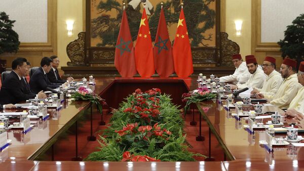 China's President Xi Jinping, left, and Moroccan King Mohammed VI, second right, attend the meeting at the Great Hall of People in Beijing, China, May 11, 2016. - Sputnik Africa