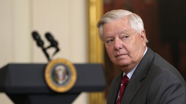 Sen. Lindsey Graham, R-S.C., waits for the arrival of President Joe Biden and the University of South Carolina Gamecocks Women's basketball team in the East Room of the White House in Washington, Tuesday, Sept. 10, 2024, for an event to welcome the and celebrate their 2023-2024 NCAA championship season. - Sputnik Africa