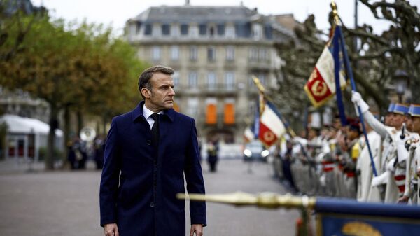 French President Emmanuel Macron reviews troops at the Place Broglie, during a ceremony to mark the 80th anniversary of the Liberation of Strasbourg, eastern France, Saturday, Nov. 23, 2024. - Sputnik Africa