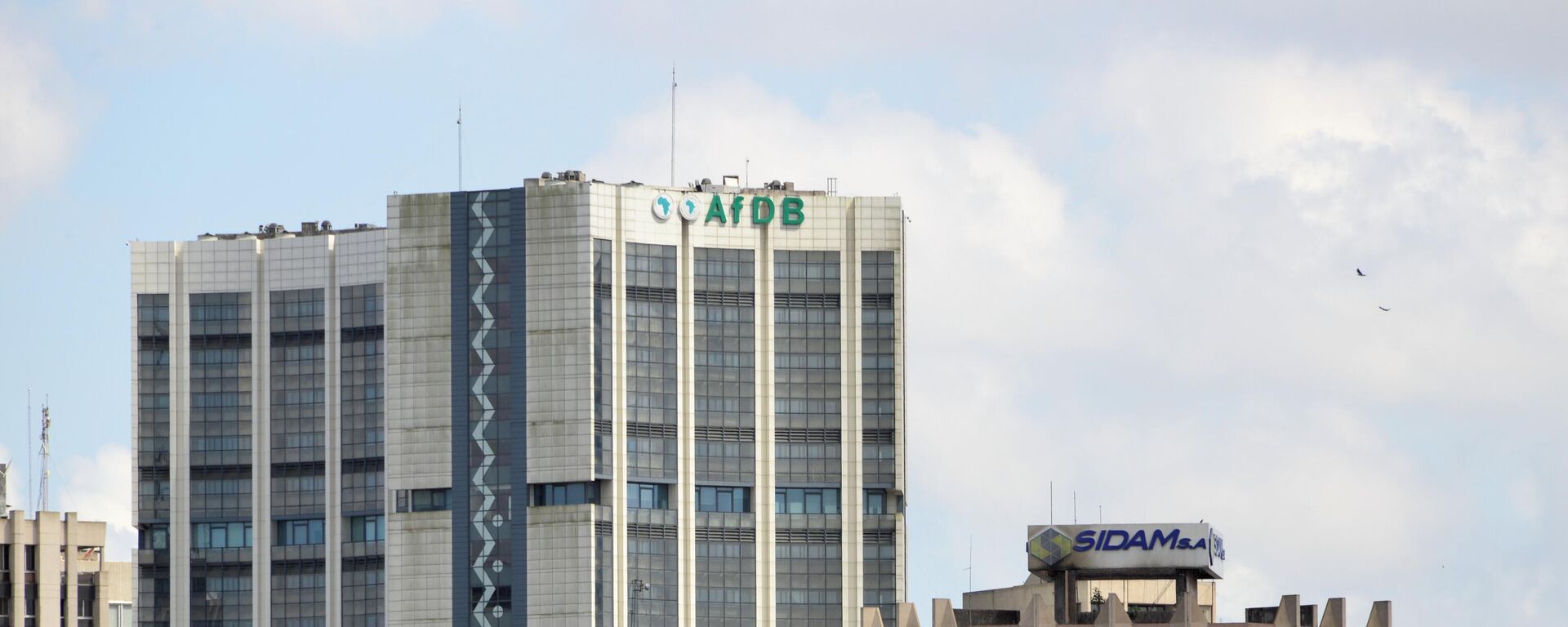 African Development Bank / African Development Fund headquarters and surrounding buildings, Plateau district - multilateral development finance institution headquartered in Abidjan, Côte d'Ivoire, the AfDB is a financial provider to African governments and private companies investing in the member countries, comprises three entities: the African Development Bank, the African Development Fund and the Nigeria Trust Fund. - Sputnik Africa, 1920, 06.12.2024