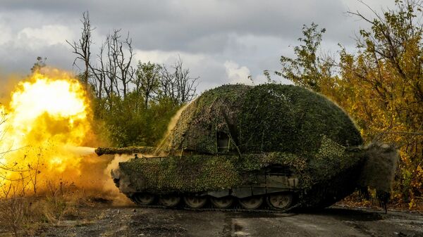 Russia’s T-72B3M tank is seen firing at the Ukrainian army’s positions in the special military operation zone. File photo  - Sputnik Africa