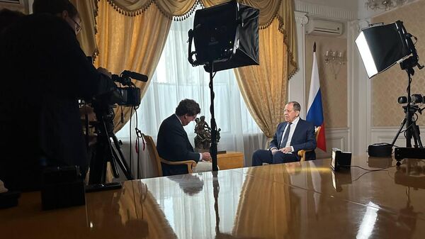 Tucker Carlson interviewing Russian FM Sergei Lavrov  - Sputnik Africa