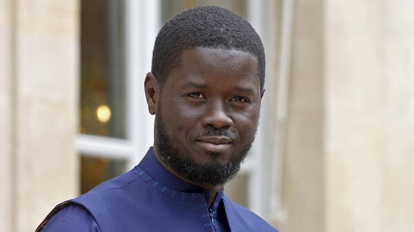 Senegal's President Bassirou Diomaye Faye poses prior to a working lunch with France's President Emmanuel Macron at the Elysee Palace on June 20, 2024 in Paris, France.  - Sputnik Africa