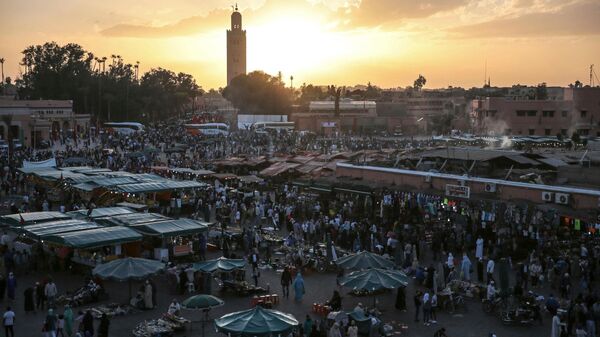 In this Nov. 5, 2016 file photo, people gather in the landmark Jemaa el-Fnaa square, in Marrakesh, Morocco. - Sputnik Africa