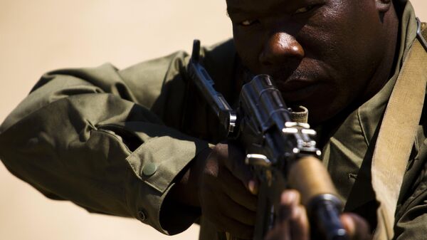 Chadian soldiers train before going on patrol in the bush of Zakouma National Park to stop the poachers attempting to kill elephants for their ivory on October 24, 2008 in Zakouma, Chad.  - Sputnik Africa