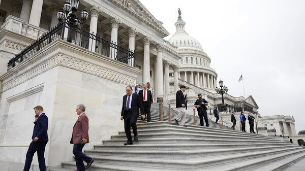 Members of the US House of Representatives leave the US Capitol after a series of votes on September 25, 2024 in Washington, DC. In a 341 to 82 vote, the House of Representatives passed legislation to avoid a funding lapse and government shutdown. - Sputnik Africa