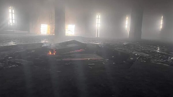 A photo of the destroyed grave of Bashar al-Assad's father Hafez in Latakia province, Syria - Sputnik Africa