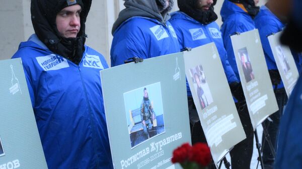 Gathering to pay tribute to the journalists killed in the exercise of their functions, in front of the building of the agency Rossiya Segodnya  - Sputnik Africa