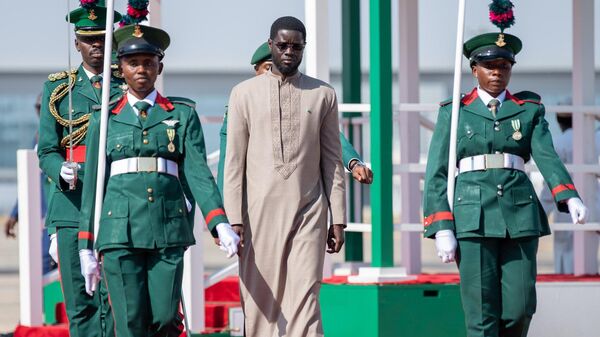 Le Président de la République du Sénégal, Bassirou Diomaye Faye, arrive à Abuja pour participer à la 66e session ordinaire de la Conférence des Chefs d’Etats de la CEDEAO - Sputnik Afrique