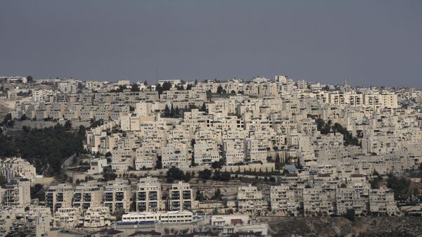 The Israeli settlement of Har Homa, seen from the West Bank city of Bethlehem, Tuesday, Dec. 17, 2024.  - Sputnik Africa