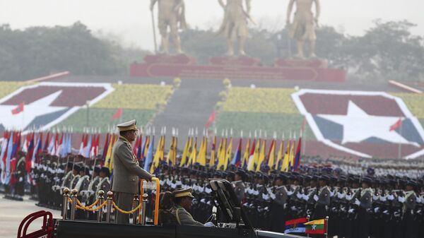 Senior Gen. Min Aung Hlaing, head of the military council, inspects officers during a parade to commemorate Myanmar's 78th Armed Forces Day in Naypyitaw, Myanmar, Monday, March 27, 2023. - Sputnik Africa