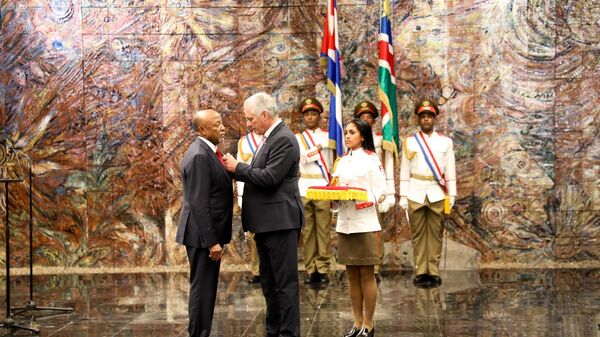 Miguel Díaz-Canel Bermúdez, First Secretary of the Communist Party of Cuba and President of the Republic of Cuba, awards President of the Republic of Namibia, Nangolo Mbumba, with a National Award of the Order of Jose Marti.  - Sputnik Africa