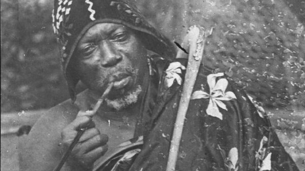 circa 1920:  King Behanzin of Dahomey, smoking a pipe.   - Sputnik Africa