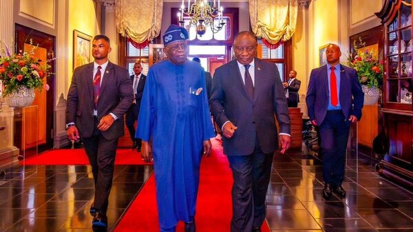 Nigerian President Bola Ahmed Tinubu (L) meets with South African President Cyril Ramaphosa (R) at the 11th session of the South Africa-Nigeria Bi-National Commission (BNC) in Cape Town, South Africa on December 3, 2024. - Sputnik Africa