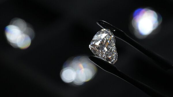 Display of rare diamonds from the ALROSA Diamond Exclusive collection in Moscow. - Sputnik Africa