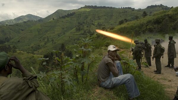 Congolese Army soldiers fire upon Laurent Nkunda's National Congress for the Defence of the People, CNDP, rebel forces the morning after the Congolese military pushed the CNDP out of the village of Mushake, North Kivu province, Democratic Republic of Congo on Dec. 5, 2007.  - Sputnik Africa