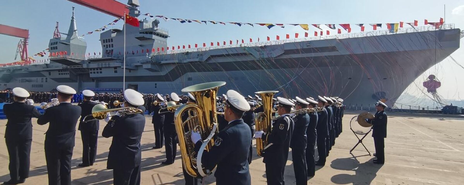 China unveils its largest and most advanced amphibious assault ship in Shanghai, naming it after the southwestern province of Sichuan, December 27, 2024.  - Sputnik Africa, 1920, 27.12.2024