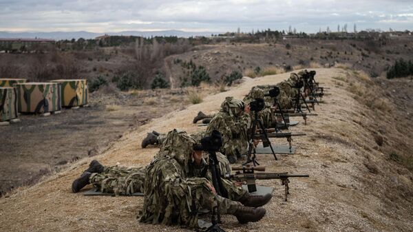 Snipers of the Turkish Armed Forces (TAF) participate in training process to hit targets up to 2 kilometers away with pinpoint accuracy at the Shooting and Expert Marksman Training Unit Command (ATUNEB) in Ankara, Turkiye on December 9, 2024.  - Sputnik Africa