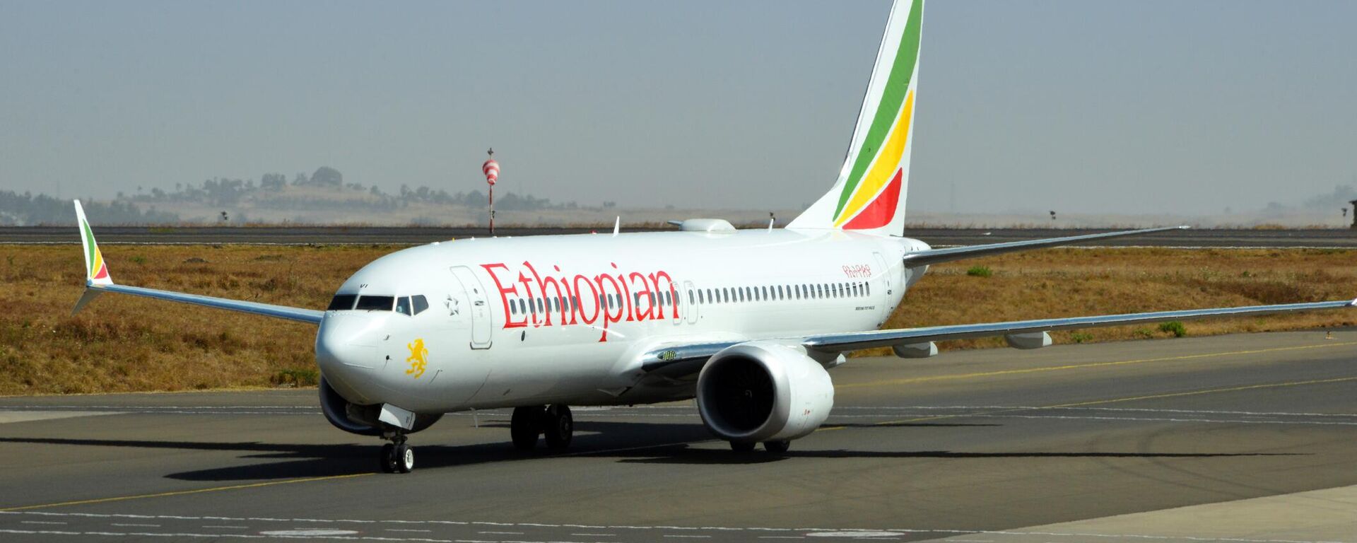 Addis Ababa, Ethiopia: Ethiopian Airlines ET-AVI (Boeing 737 NG / Max - MSN 62448), twin of the Ethiopian 737 MAX ET-AVJ that crashed on 10 March 2019 (Flight 302) - taxiing at Addis Ababa Bole International Airport - Sputnik Africa, 1920, 29.12.2024