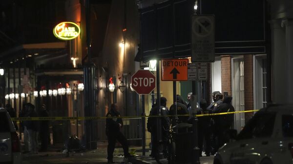 Emergency services attend the scene after a vehicle drove into a crowd on New Orleans' Canal and Bourbon Street - Sputnik Africa