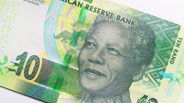 In this photo illustration, a close up of a 10 Rand note from South Africa featuring Nelson Mandela photographed on October 5,2020 in London,England.  - Sputnik Africa