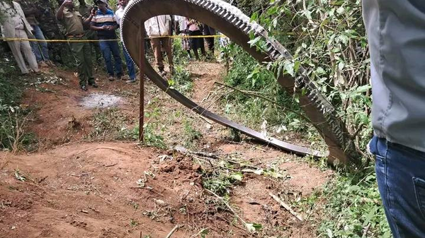 A large metallic ring, believed to be a part of a launch rocket, crash-landed in Mukuku village in Kenya’s Makueni County, southeast of Nairobi. - Sputnik Africa