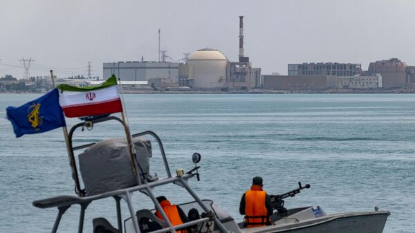 An Islamic Revolutionary Guard Corps (IRGC) speed boat is sailing along the Persian Gulf during the IRGC marine parade, which is commemorating the Persian Gulf National Day, near the Bushehr nuclear power plant in the seaport city of Bushehr, Bushehr province, in the south of Iran, on April 29, 2024.  - Sputnik Africa