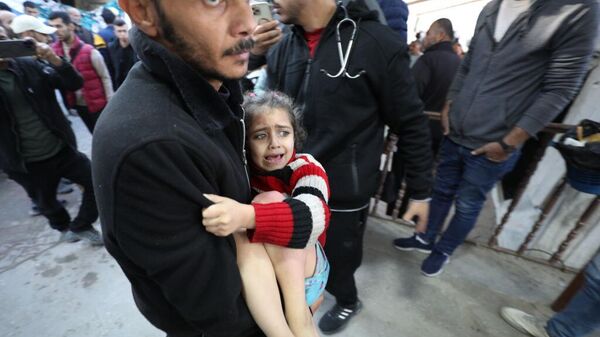 GAZA CITY, GAZA - JANUARY 03: Palestinians, including children injured in an Israeli attack on Gaza City are brought to al-Ahli Baptist Hospital for treatment in Gaza City on January 03, 2025. - Sputnik Africa