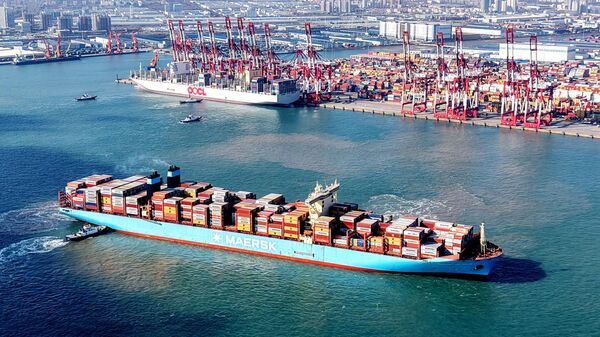 A Maersk container ship turns around in a port in Qingdao in east China's Shandong province Thursday, Dec. 26, 2024.  - Sputnik Africa