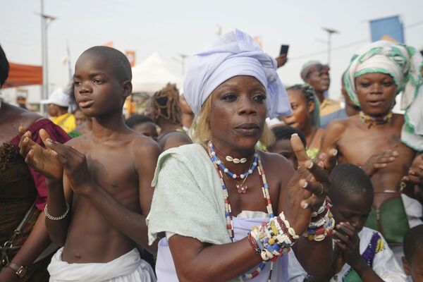 Voodoo worshipers dance ahead of the annual Voodoo Festival, Ouidah, Benin, Jan. 9, 2025. - Sputnik Africa